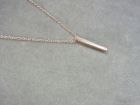 Karma zilveren Tube collier, rosé goldplated.