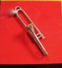 Trombone als zilveren reverpin.