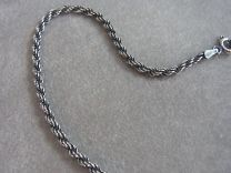 Koord armband 2,5 mm 19 cm. Donker zilver.