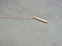 Karma zilveren Tube collier, rosé goldplated.